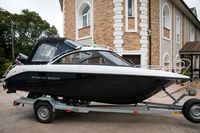 Катер Phoenix СПЭВ 600HT, мотор лодочный Suzuki DF150TL, прицеп